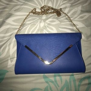 ALDO blue clutch